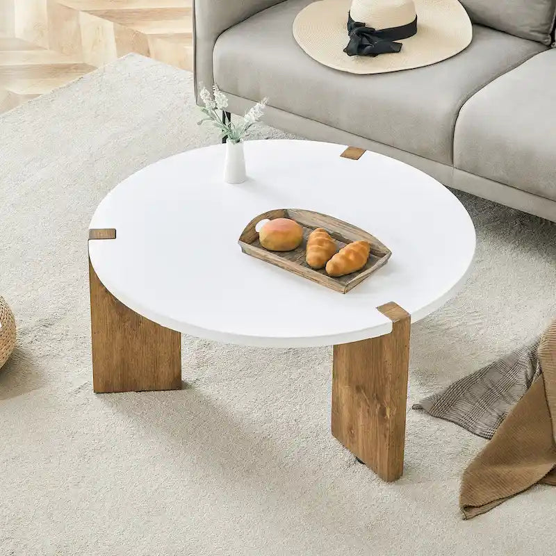 Tavolino rotondo con gambe rettangolari