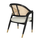 Sedia da pranzo in rattan con seduta imbottita e braccioli